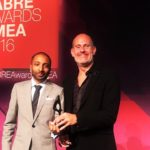 – OPR-EMEA-CEO-Michael-Frohlich-receiving-the-trophy